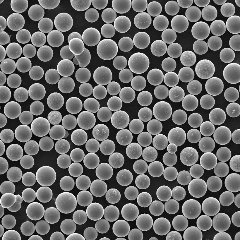 Spherical metal powder under an electron microscope